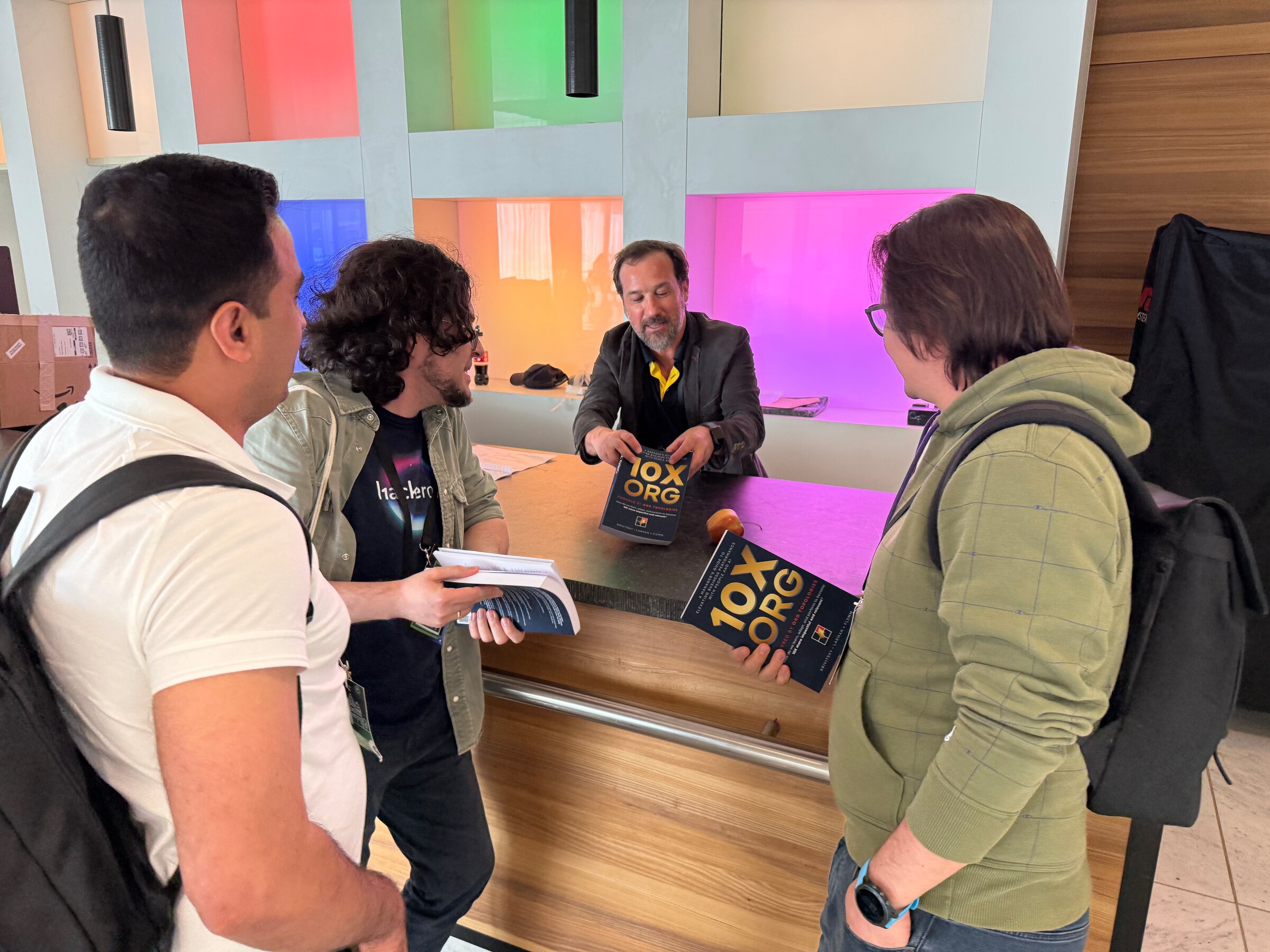 Alexey Krivitsky at a 10X ORG signing session, DevWorld 2026